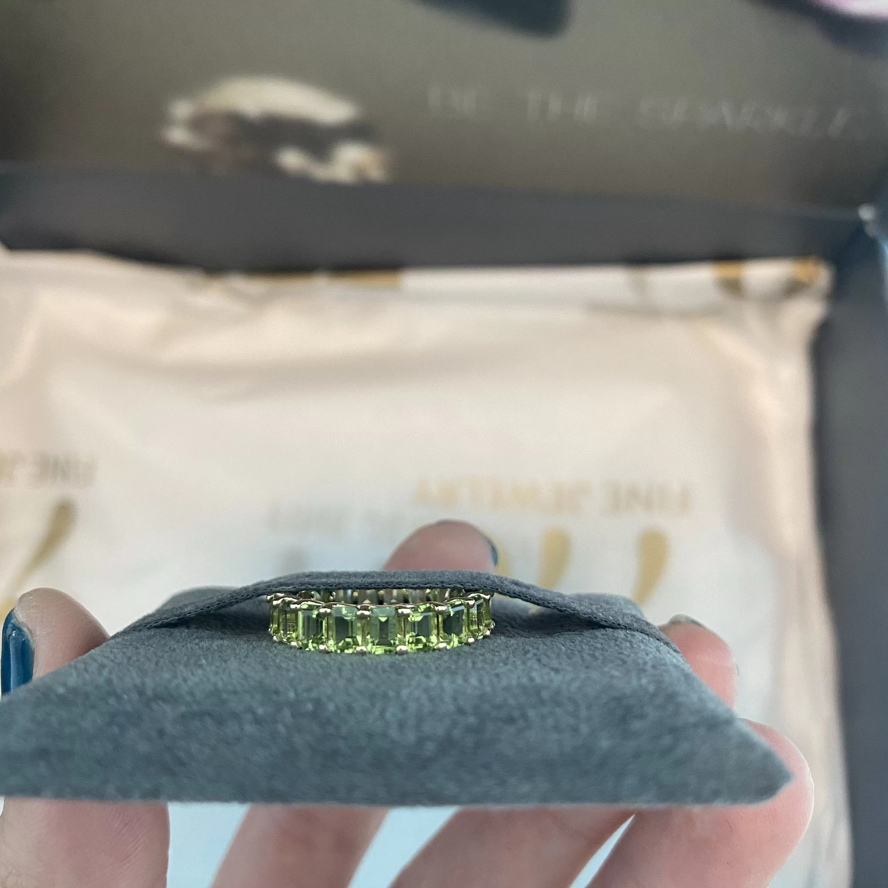 14k Gold Emerald Cut Peridot Eternity Band