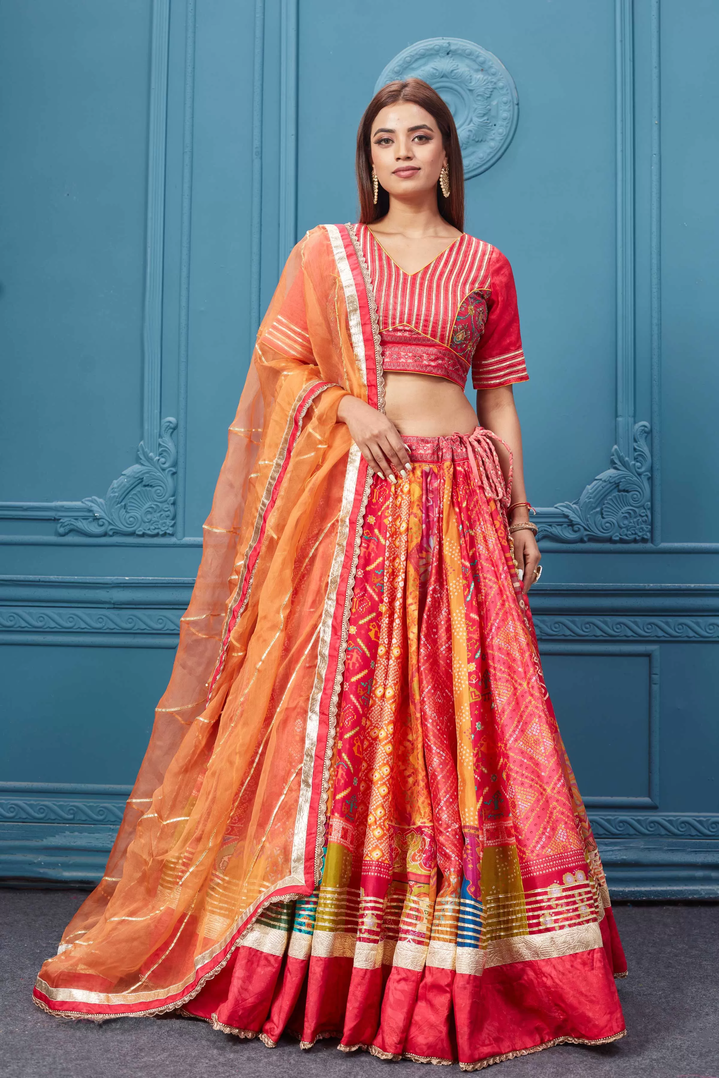 310034 Red Bandhej Printed Lehenga with Gotta Pati Work