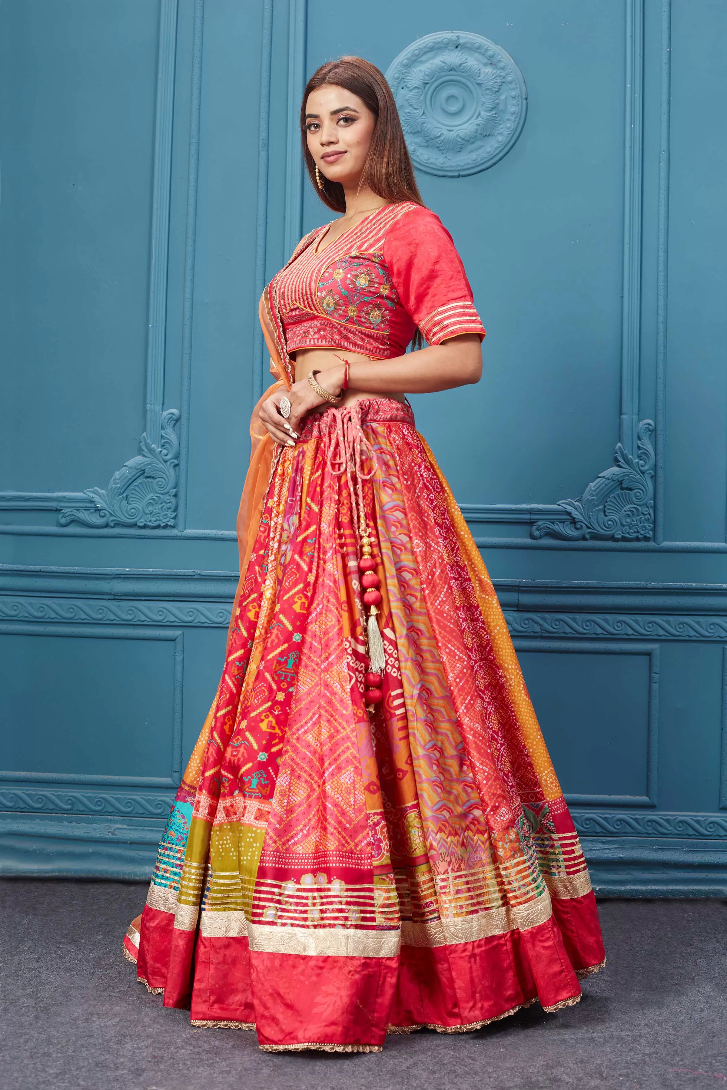 310034 Red Bandhej Printed Lehenga with Gotta Pati Work