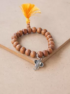 Sandal Wood Beaded Bracelet with Charm ( Ganesh )